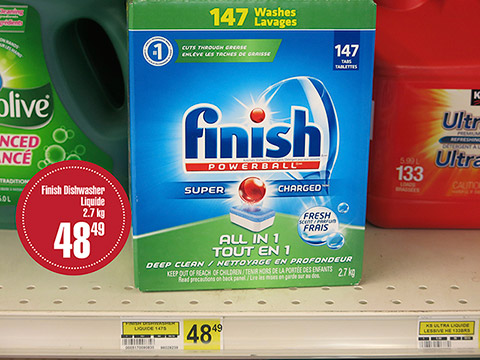 A box of 147 dishwasher detergent tablets of the brand Finish Powerball, totalling 2.7 kilograms, is placed on a display. A label specifies its selling price of $48.49.